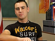 Young brunette twink Justin Giles sits at a desk in a classroom and the man behind the camera asks him questions about his experience in porn, his sex